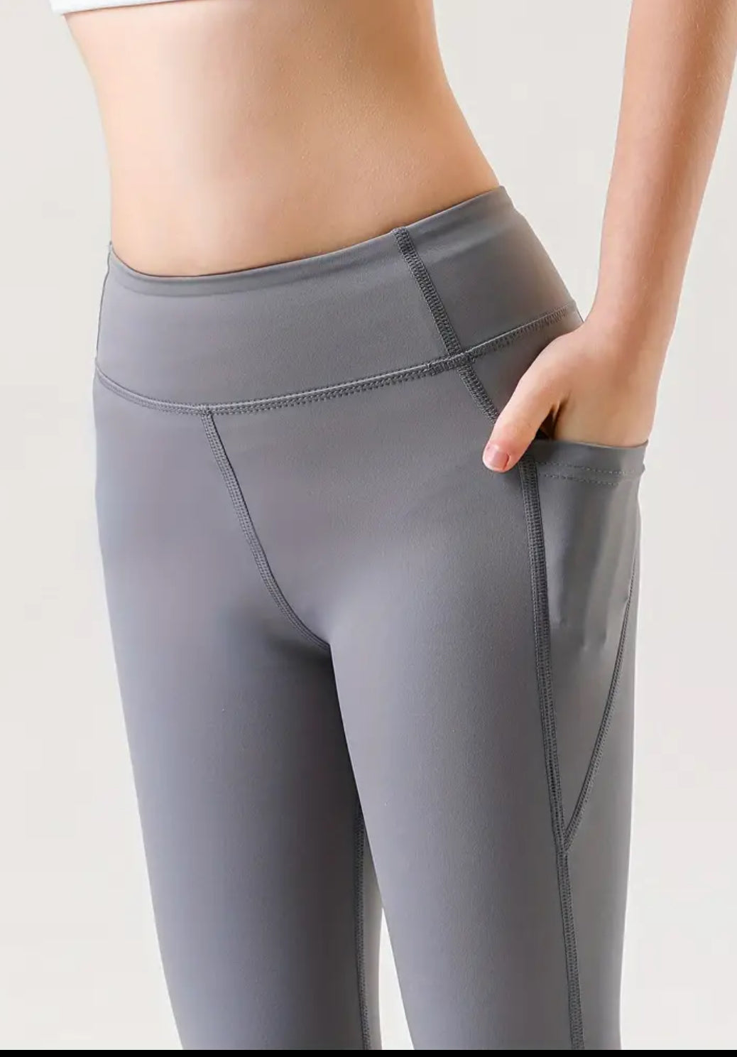 Leggings 3/4 yoga con bolsa